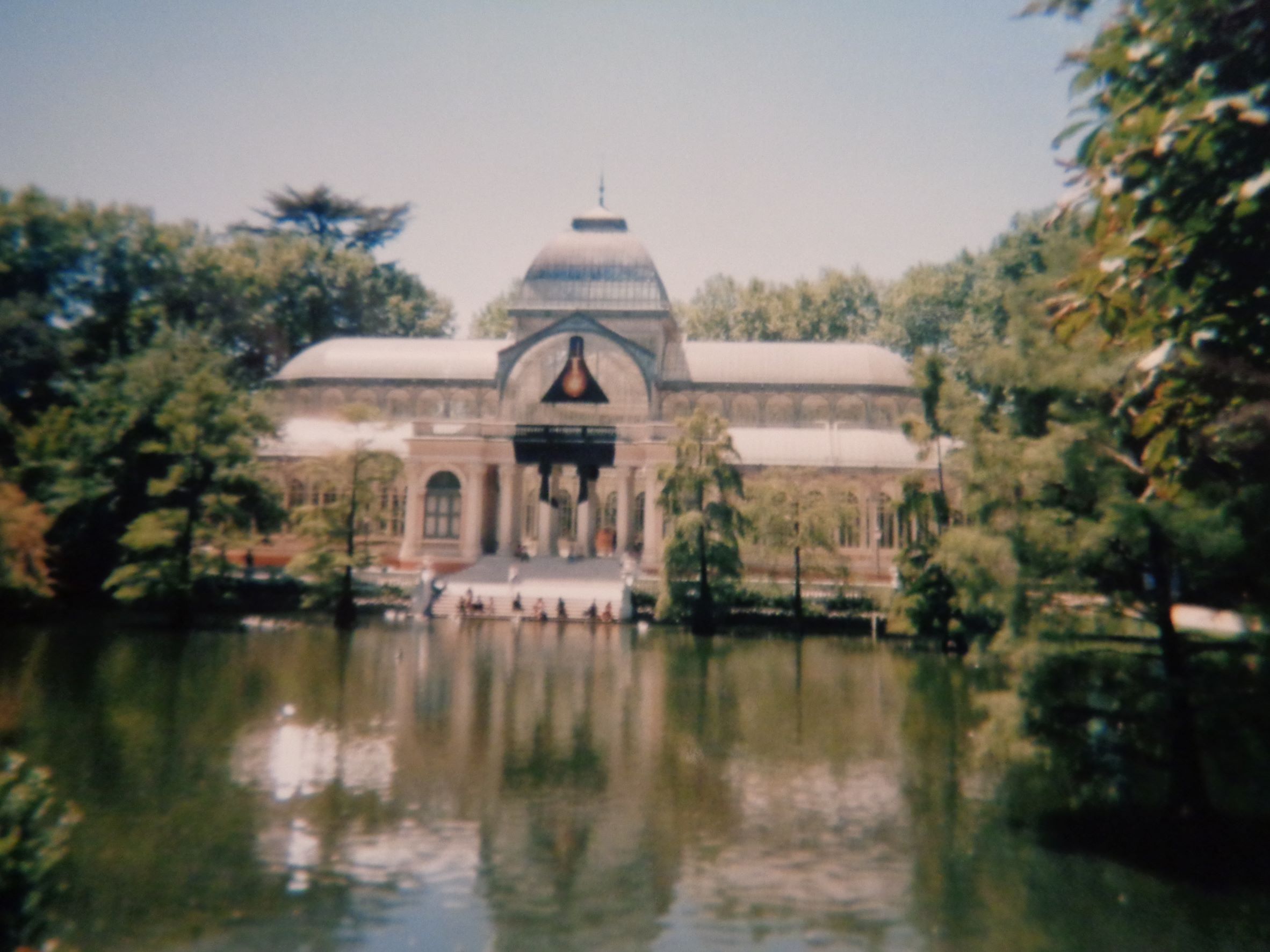 Madrid Retiro palacio de cristal over pond